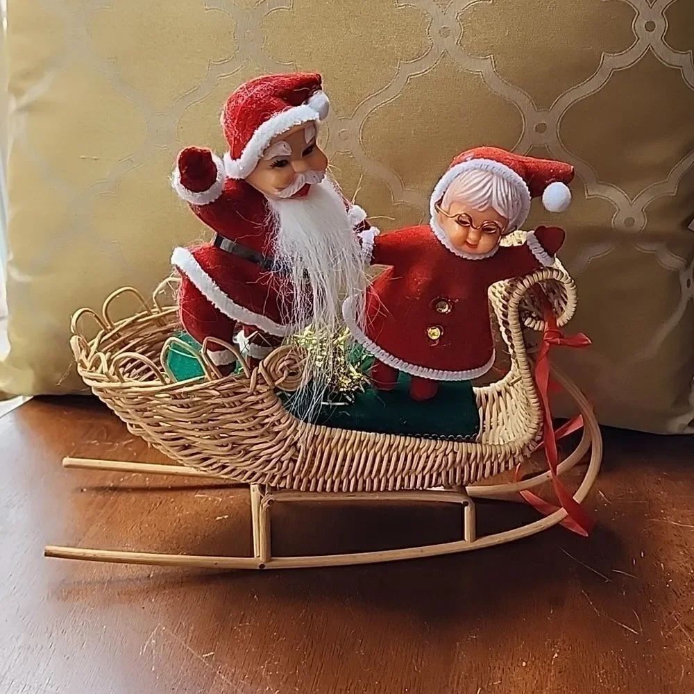 Vintage Flocked Mr. and Mrs. Claus in wicker Sled